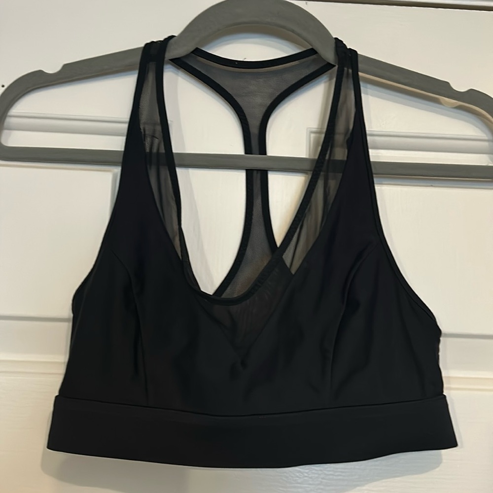 Black lululemon sports bra with mesh detail
